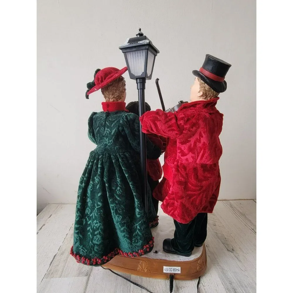 Christmas International AS IS Victorian caroler family animated motion Xmas deco